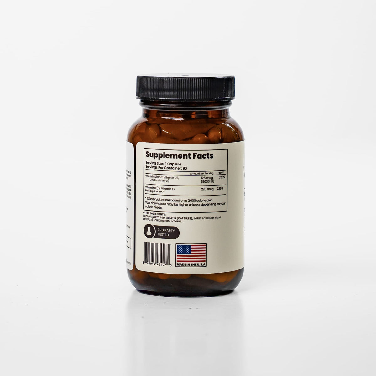 Bottle of Purishh Vitamin D3 & K2 core supplement capsules with label, set against a neutral background.