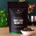 Sweet Lemon Oolong Green Tea from Superbloom by August Uncommon Tea in a 15-cup bag, fresh and aromatic oolong tea leaves.