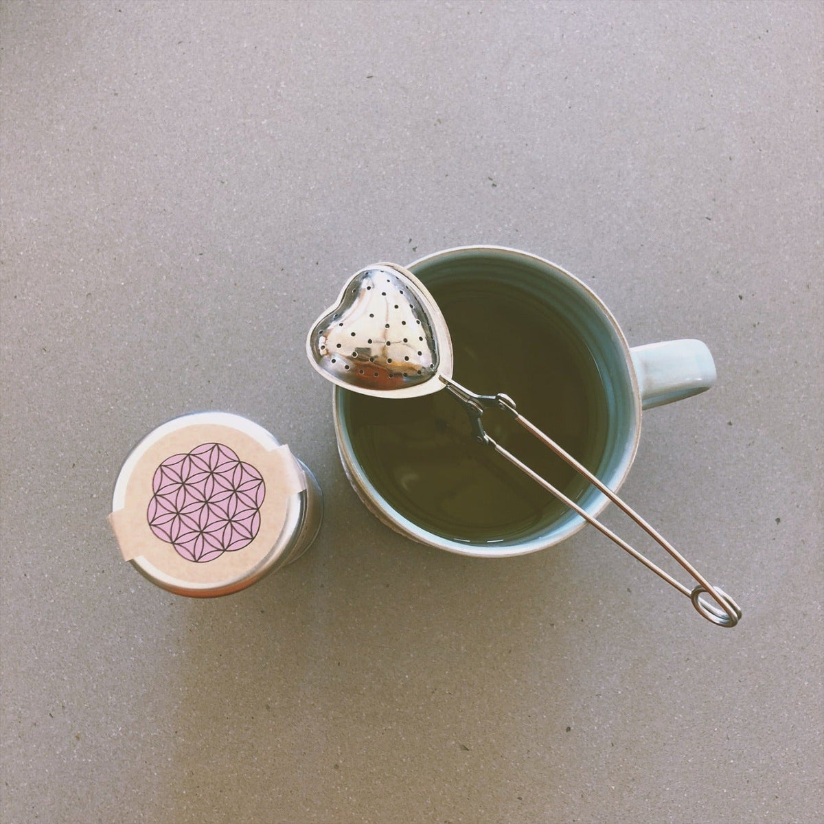 Paavani Ayurveda stainless steel heart-shaped tea infuser with mesh strainer for loose-leaf tea brewing in a simple, elegant design