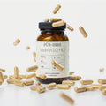 Purishh Vitamin D3 & K2 Core Supplements bottle with label, showing supplement capsules and branding.