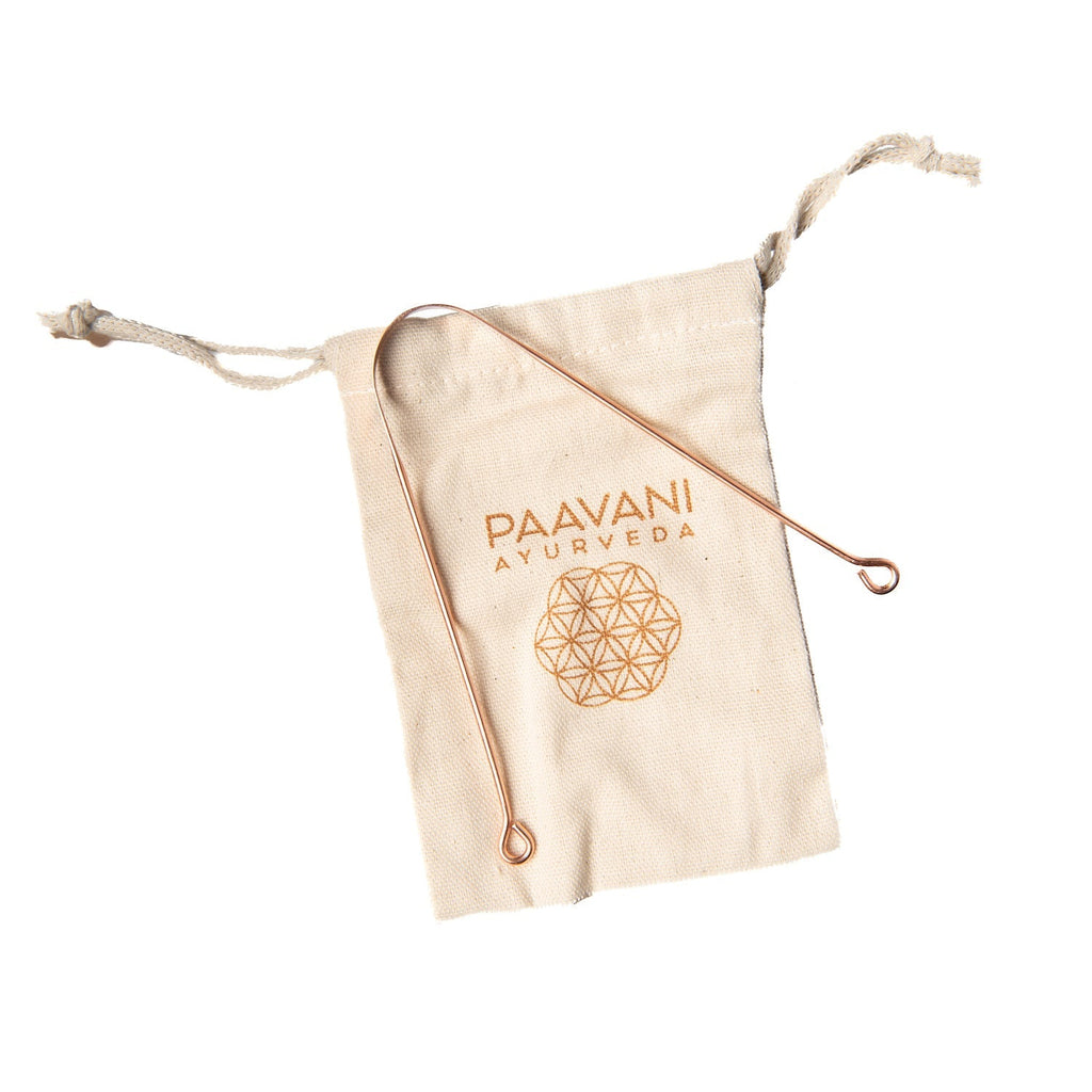Copper tongue cleaner from Paavani Ayurveda for Ayurvedic tongue scraping, fresh breath, and daily detox.