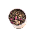 Paavani Ayurveda Bliss Blend tridoshic tea in a simple tea cup, promoting relaxation and harmony with herbal ingredients.