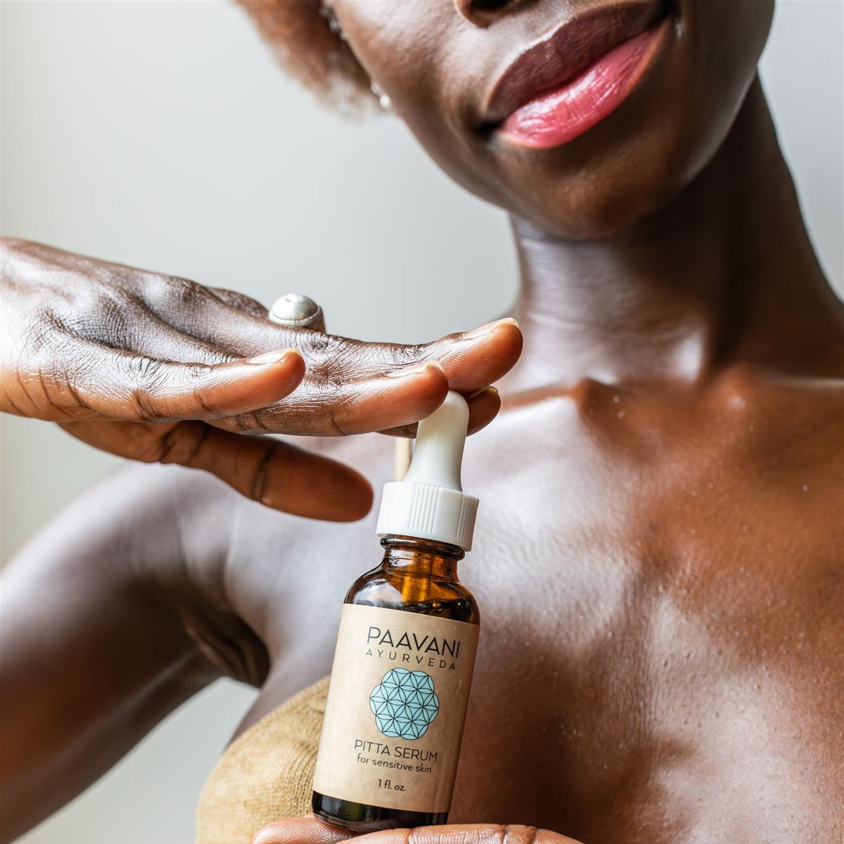 Paavani Ayurveda Pitta Serum Ayurvedic face oil for sensitive skin, featuring natural ingredients in a simple glass bottle.