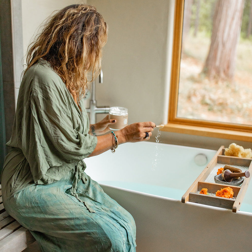 Paavani Ayurveda coconut milk bath with herbal ingredients, showing a relaxing soaking ritual for skin and spirit.