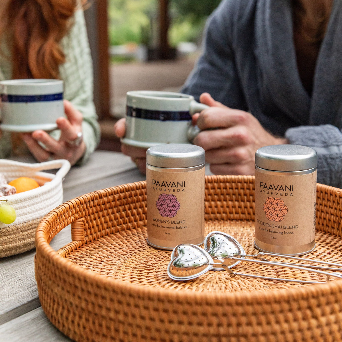 Stainless steel heart-shaped tea infuser by Paavani Ayurveda for loose-leaf tea brewing, with a simple strainer design.