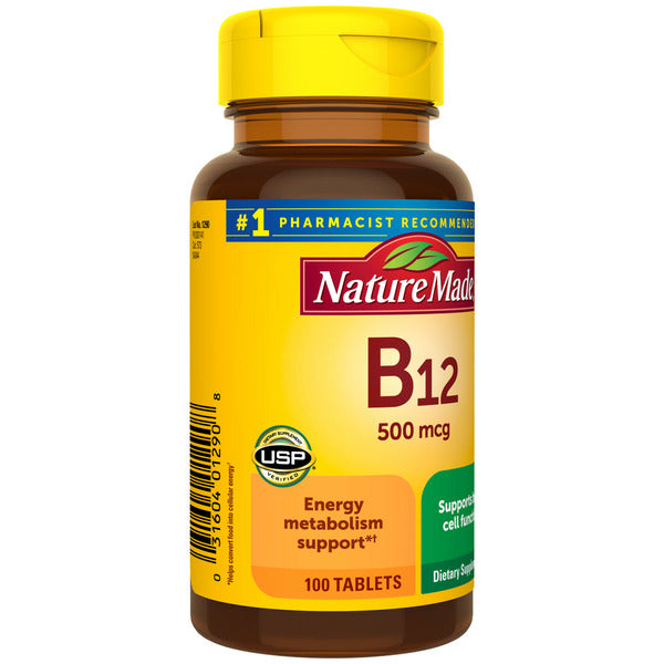 Nature Made Vitamin B12 500 mcg tablets shown in a bottle with a white label and blue cap, arranged on a white surface.